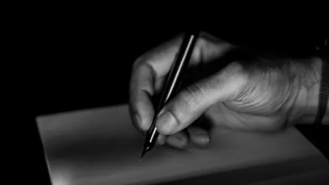 A pen and paper document illustrating the need to understand an obligation before signing